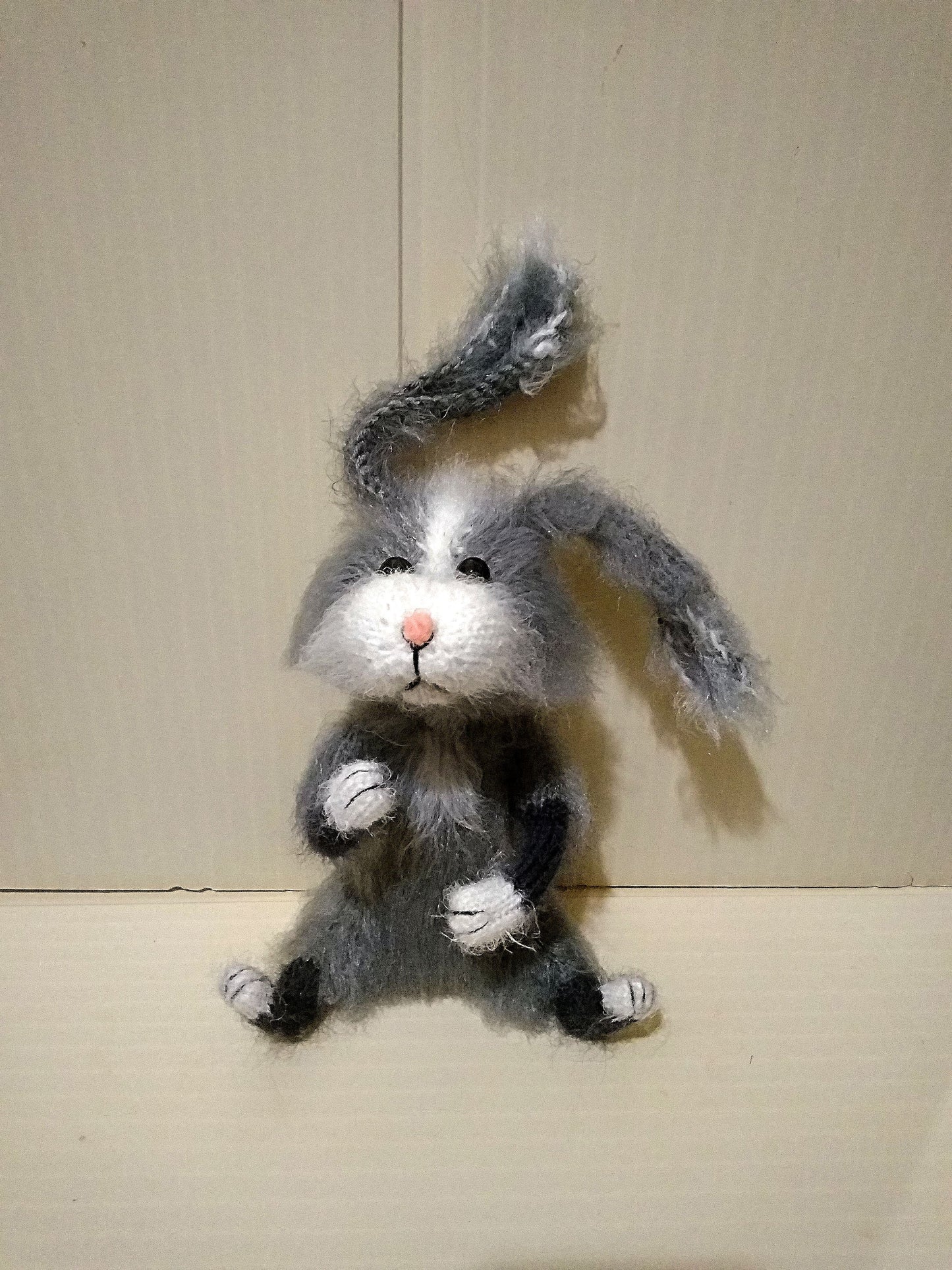 Stuffed knitted bunny toy made with acrylic yarn with cute face. perdect for families with children for sell