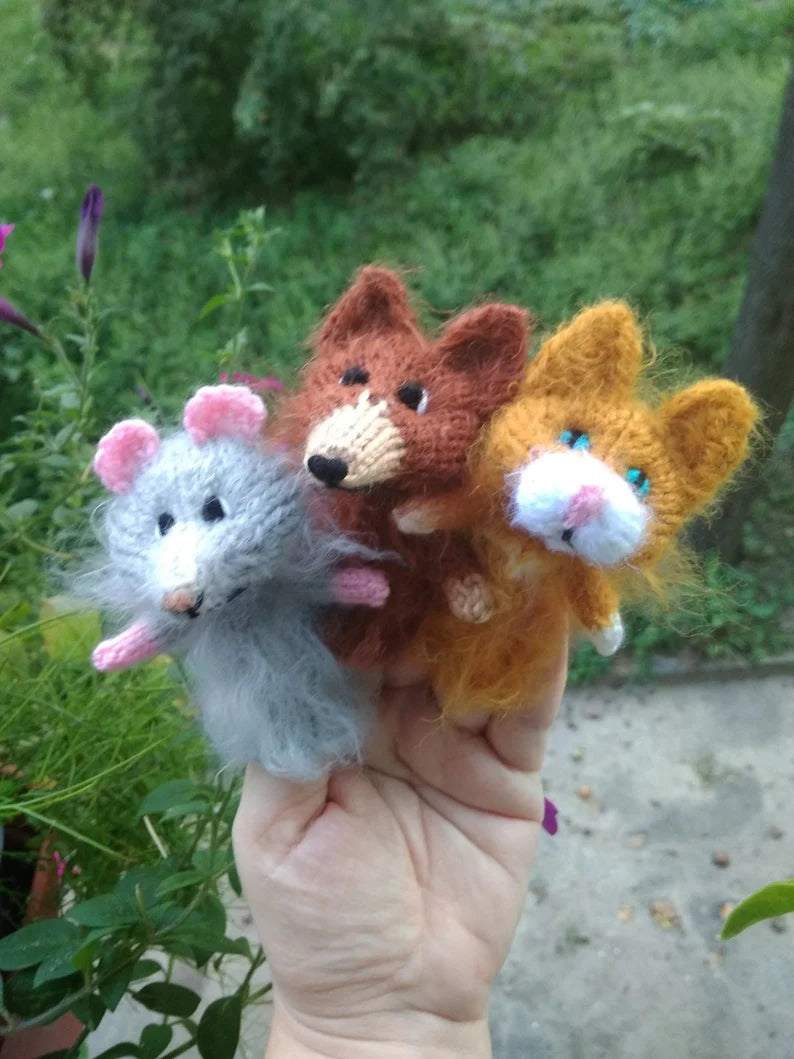 Finger set of puppets in the form of a cat, dog and mouse knitted from yarn