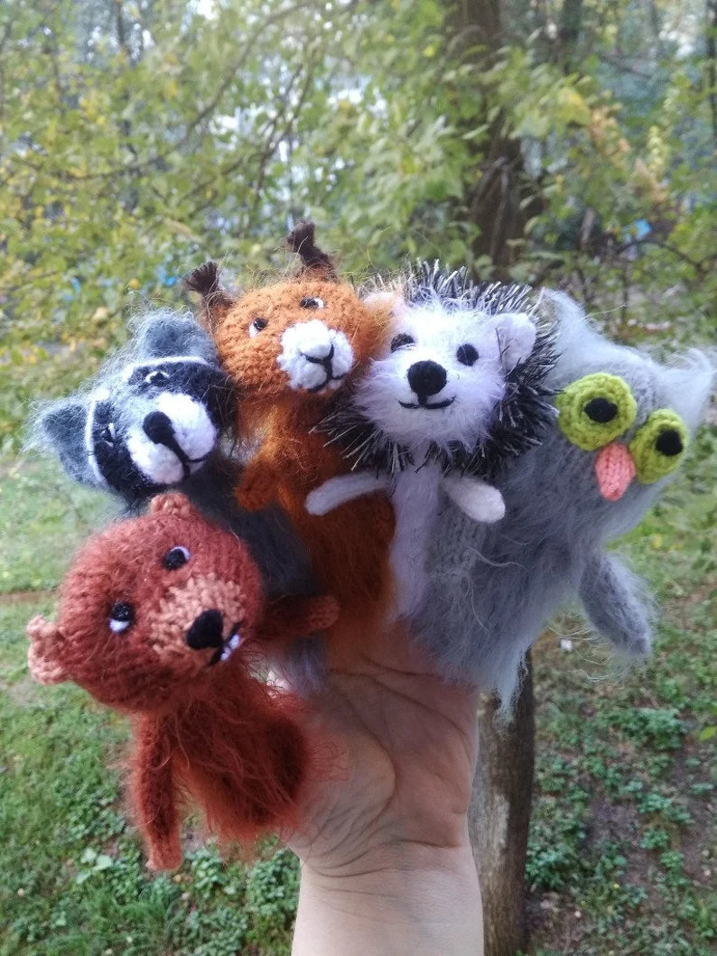 set of crochet animal finger puppets including owl, raccoon, hedgehog, squirrel, beaver puppets